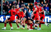Edinburgh's Darcy Graham is challenged by Cardiff players at the Hive Stadium, on October 19, 2024. (Photo by Ewan Bootman / SNS Group)