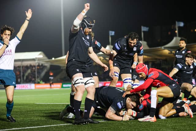 Nathan McBeth, grounded, scores a try for Glasgow Warriors against Emirates Lions at Scotstoun, his fourth in a row for the club.