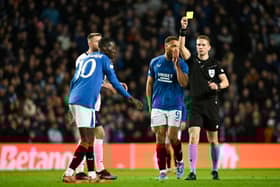 Mohamed Diomande receives a yellow card against Fenerbahce which has ruled him out of the Europa League quarter-final first leg against Athletic Bilbao at Ibrox. (Photo by Rob Casey / SNS Group)