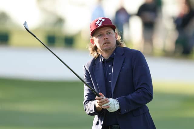Cameron Smith sporting his blue blazer on the practice area at Augusta National Golf Club on Wednesday