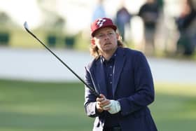 Cameron Smith sporting his blue blazer on the practice area at Augusta National Golf Club on Wednesday