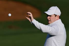Bob MacIntyre catches a ball on the practice area prior to the 2025 Masters Tournament at Augusta National Golf Club