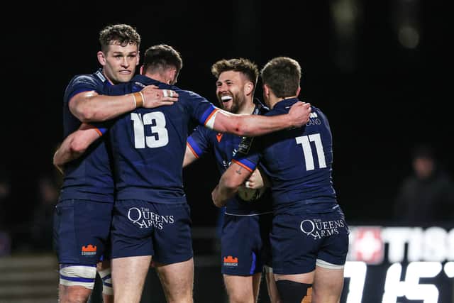 Edinburgh's Ali Price celebrates with Magnus Bradbury, Matt Currie and Ross McCann as he scores the fourth try of the Challenge Cup victory over Emirates Lions. (Photo by Ewan Bootman / SNS Group)