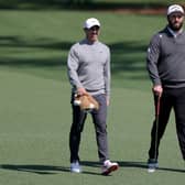 Rory McIlroy and Jon Rahm walk on the second hole during a practice round on Wednesday prior to the 2025 Masters Tournament at Augusta National Golf Club 