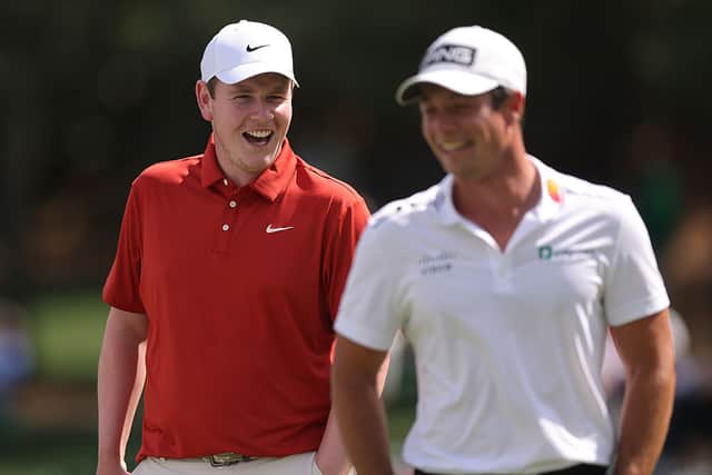 Bob MacIntyre shares a laugh with Ryder Cup team-mate Viktor Hovland at Augusta National Golf Club