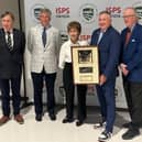 Lewine Mair pictured receiving the PGA of America Lifetime Achievement Award in Journalism from  PGA of America president Don Rea jnr. Also pictured are Mair's Global Golf Post colleagues John Hopkins and Ron Green jnr as well as Jim Nugent, the digital publication's publisher