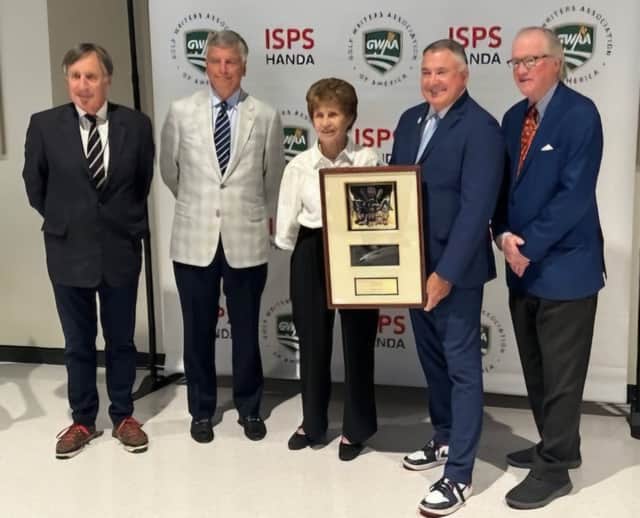 Lewine Mair pictured receiving the PGA of America Lifetime Achievement Award in Journalism from PGA of America president Don Rea jnr. Also pictured are Mair's Global Golf Post colleagues John Hopkins and Ron Green jnr as well as Jim Nugent, the digital publication's publisher