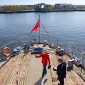 The Princess Royal onboard TS Queen Mary with Iain Sim, chairman of the Friends of TS Queen Mary