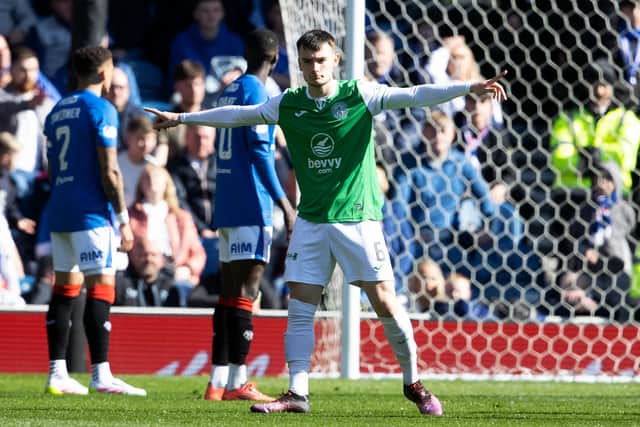 Dylan Levitt celebrates after putting Hibs 1-0 ahead against Rangers at Ibrox on Saturday. (Photo by Alan Harvey / SNS Group)