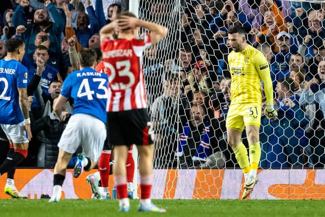 Rangers goalkeeper Liam Kelly (R) celebrates saving a penalty from Athletic Club's Alex Berenguer. (Photo by Alan Harvey / SNS Group)