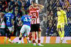Rangers goalkeeper Liam Kelly (R) celebrates saving a penalty from Athletic Club's Alex Berenguer. (Photo by Alan Harvey / SNS Group)