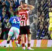 Rangers goalkeeper Liam Kelly (R) celebrates saving a penalty from Athletic Club's Alex Berenguer. (Photo by Alan Harvey / SNS Group)