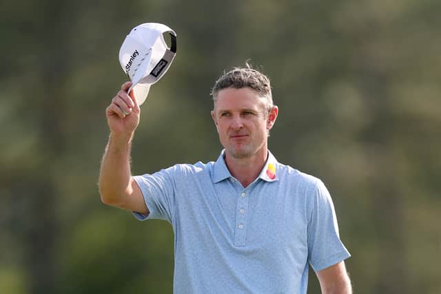 Justin Rose acknowledges the patrons after securing the first-round lead in the 89th Masters at Augusta National Golf Club 