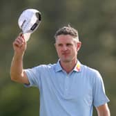 Justin Rose acknowledges the patrons after securing the first-round lead in the 89th Masters at Augusta National Golf Club 