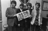 Original copies of some Beatles records - like versions of 'Sergeant Pepper's Lonely Hearts Club Band', as modelled by the band here - can be worth serious money.