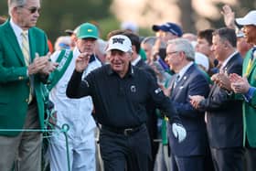 Former Rangers chairman Dave King carries Gary Player’s bag to the first tee for the Honorary Starters getting the event underway