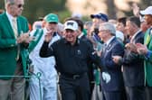 Former Rangers chairman Dave King carries Gary Player’s bag to the first tee for the Honorary Starters getting the event underway