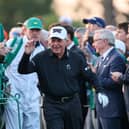 Former Rangers chairman Dave King carries Gary Player’s bag to the first tee for the Honorary Starters getting the event underway
