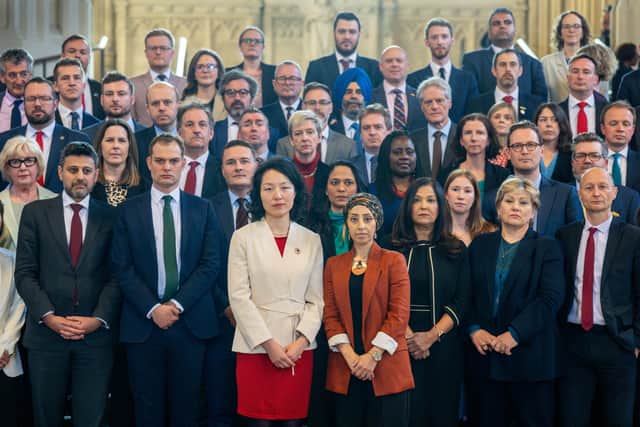 Members of Parliament gather with Yuan Yang (centre left) and Abtisam Mohamed (centre right) in Westminster Hall in the Houses of Parliament, London, to show support for the two Labour MPs who were denied entry to Israel are on their way home to the UK.
