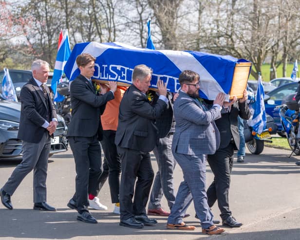 Keith Brown MSP, centre, carries the coffin at the funeral of his partner and Scottish Government minister Christina McKelvie at Daldowie crematorium in Glasgow