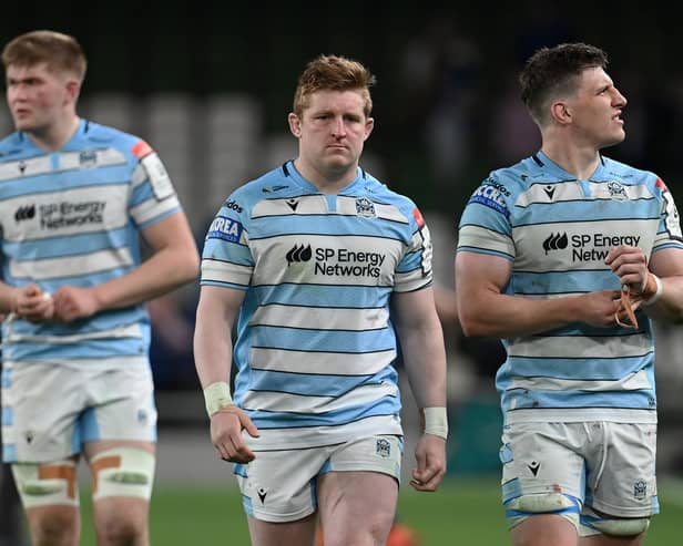 Dejection for Euan Ferrie, Johnny Matthews and Rory Darge of Glasgow Warriors after the heavy defeat by Leinster in the Investec Champions Cup quarter-final in Dublin.