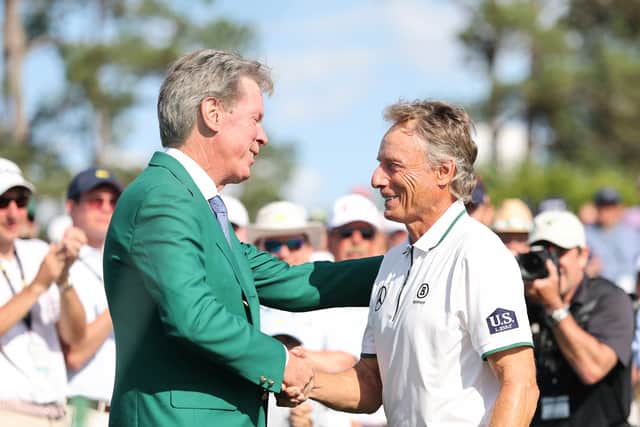 Augusta National Chairman Fred Ridley shakes hands with Bernhard Langer after his final round at Augusta National Golf Club 