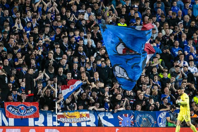 Rangers fans celebrate Liam Kelly's penalty save.