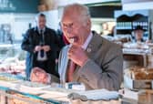 King Charles tries a sheep's milk cheese called Love Ewe at Tebay Services on the southbound carriageway of the M6 (Picture: Arthur Edwards)