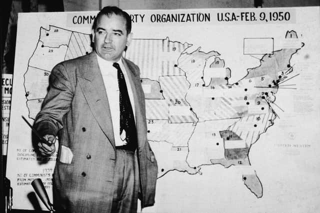 Joe McCarthy uses a map showing alleged communist activity in the US during a 1954 hearing in Washington