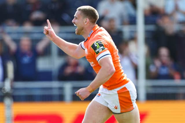 James Lang celebrates scoring  Edinburgh's third try during the EPCR Challenge Cup quarter-final win over the Vodacom Bulls.