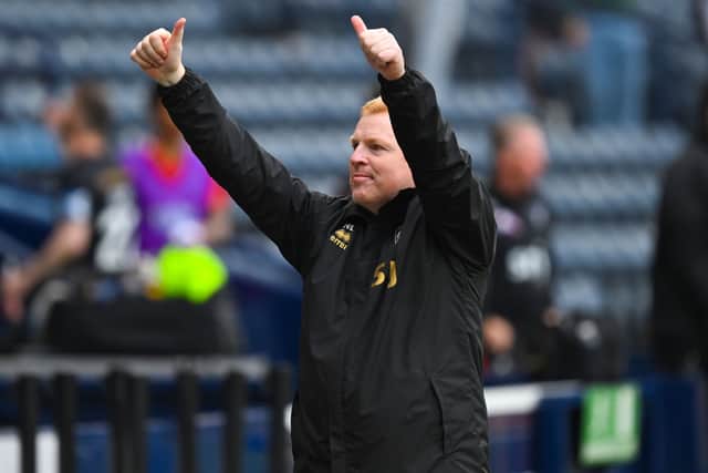 Neil Lennon celebrates Dunfermline's win at Queen's Park.