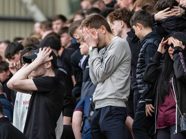 Hearts fans react as they crash out of the top six.