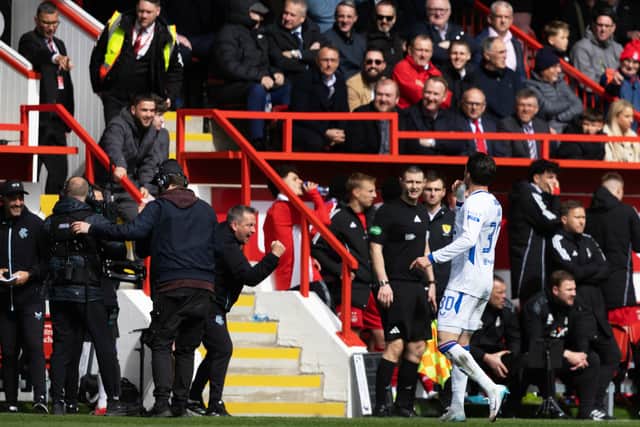 The Rangers bench celebrate the leveller at Pittodrie.