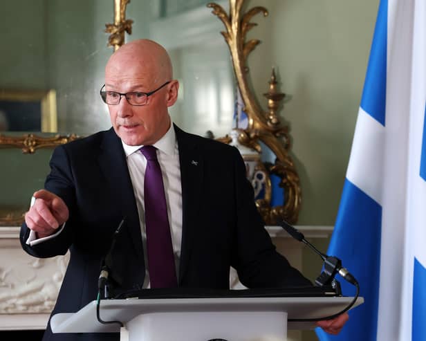 John Swinney during a press conference in Bute House