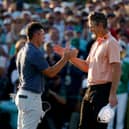 Rory McIlroy and Justin Rose shake hands after their play-off in the 89th Masters 