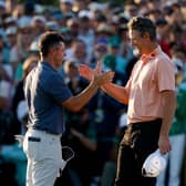 Rory McIlroy and Justin Rose shake hands after their play-off in the 89th Masters 