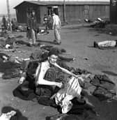 A survivor at Bergen-Belsen concentration camp shortly after it was liberated by British troops on April 15, 1945 (Picture: Galerie Bilderwelt)