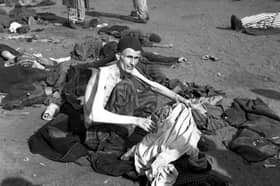 A survivor at Bergen-Belsen concentration camp shortly after it was liberated by British troops on April 15, 1945 (Picture: Galerie Bilderwelt)