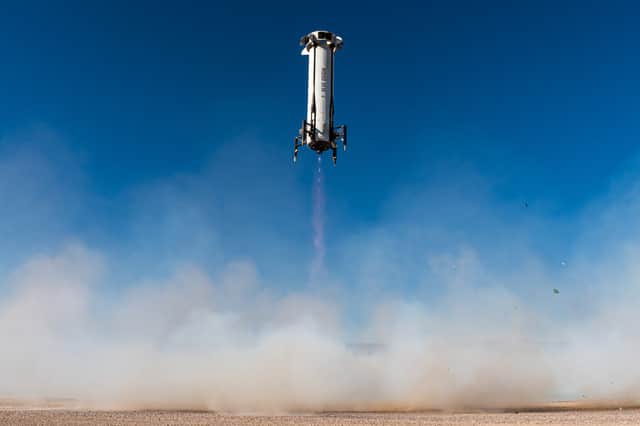 The New Shepard Booster landing. 