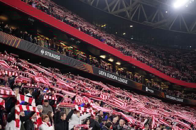 Athletic Bilbao fans hold up match scarfs at the San Mames earlier this year.