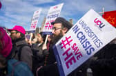 University staff protest against planned job cuts in a rally outside the Scottish Parliament (Picture: Lisa Ferguson)