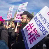 University staff protest against planned job cuts in a rally outside the Scottish Parliament (Picture: Lisa Ferguson)