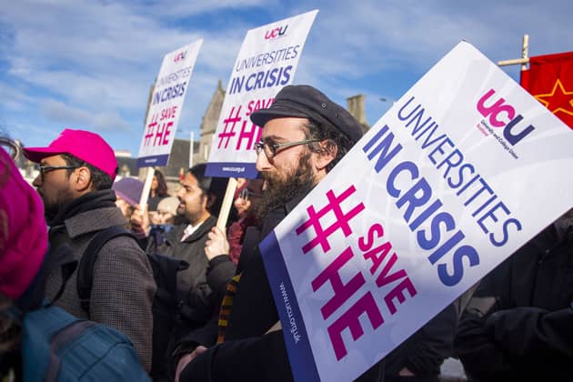 University staff protest against planned job cuts in a rally outside the Scottish Parliament (Picture: Lisa Ferguson)