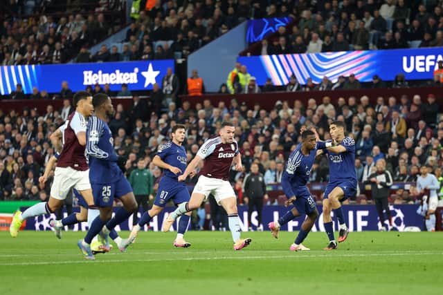 John McGinn scores Aston Villa's second goal against PSG.