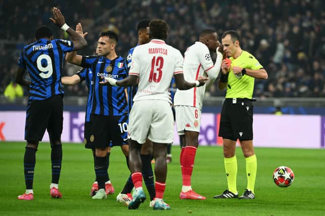 Monaco defender Christian Mawissa is sent off by Irfan Peljto earlier this season.
