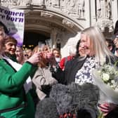 Susan smith (centre left) and Marion Calder (centre right) co-directors of For Women Scotland with campaigners celebrate outside the Supreme Court in London after terms "woman" and "sex" in the Equality Act refer to a biological woman and biological sex, the Supreme Court has ruled. Picture: Lucy North/PA Wire