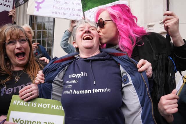 Campaigners celebrate outside the Supreme Court in London