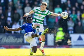Celtic's Alistair Johnston (R) and St Johnstone's Benjamin Kimpioka in action during St Johnstone's 1-0 win over Celtic at McDiarmid Park earlier this month. Cr: SNS Group.