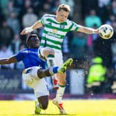 Celtic's Alistair Johnston (R) and St Johnstone's Benjamin Kimpioka in action during St Johnstone's 1-0 win over Celtic at McDiarmid Park earlier this month. Cr: SNS Group.