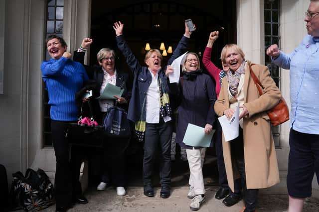 Campaigners for For Women Scotland, including former SNP MP Jo Cherry (second from left), celebrate outside the Supreme Court in London. Picture: Lucy North/PA Wire 